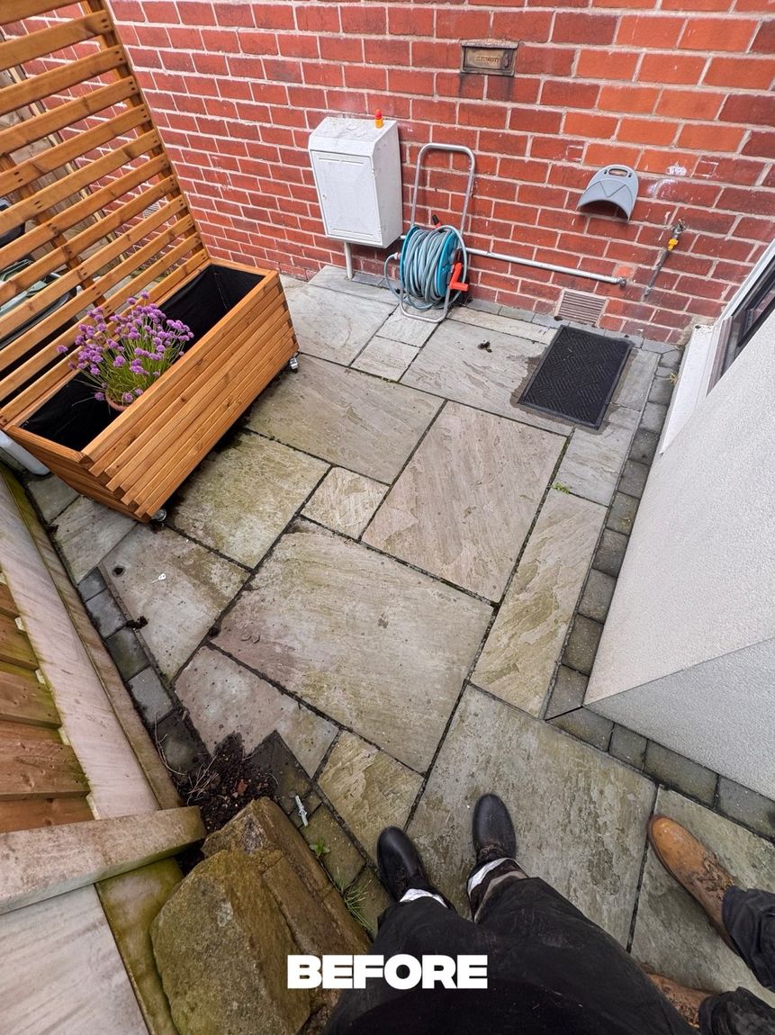 Corner patio before cleaning